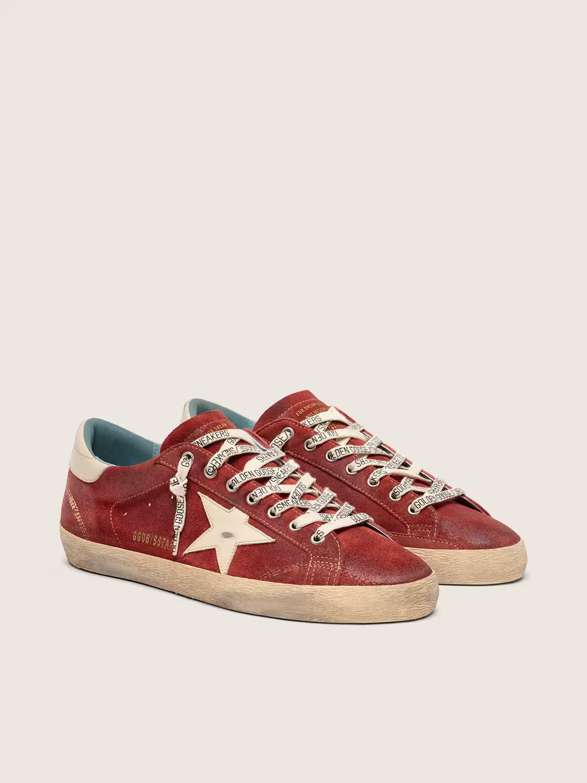 Star in red suede with cream leather