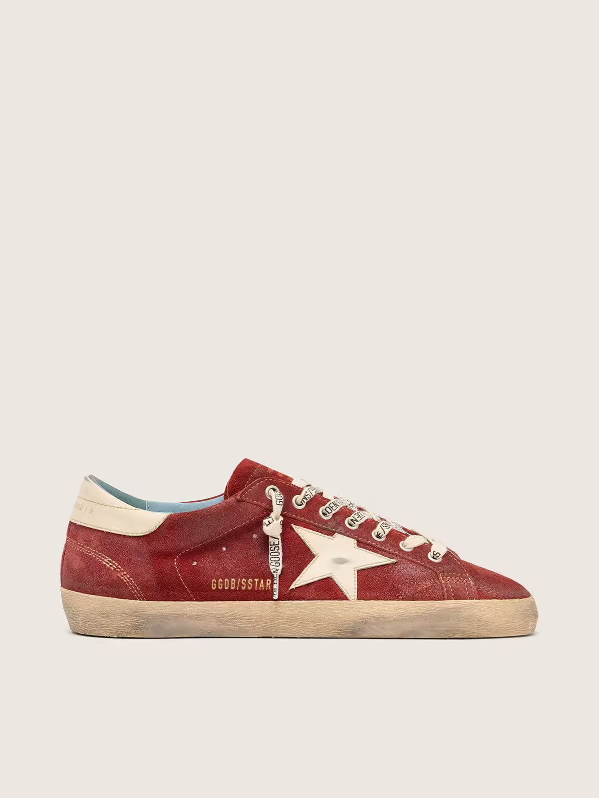 Star in red suede with cream leather