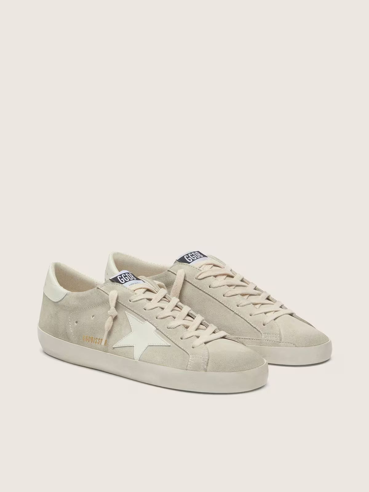 Star in light gray suede with