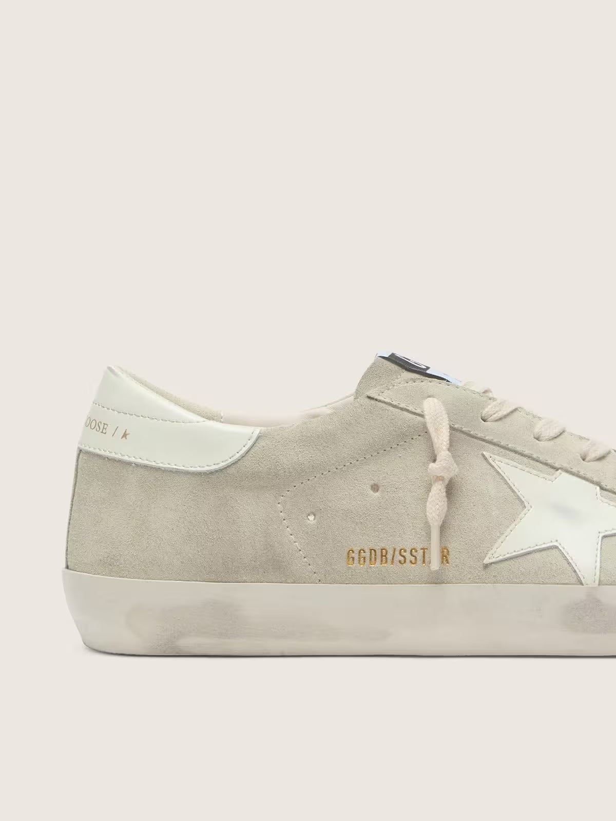 Star in light gray suede with