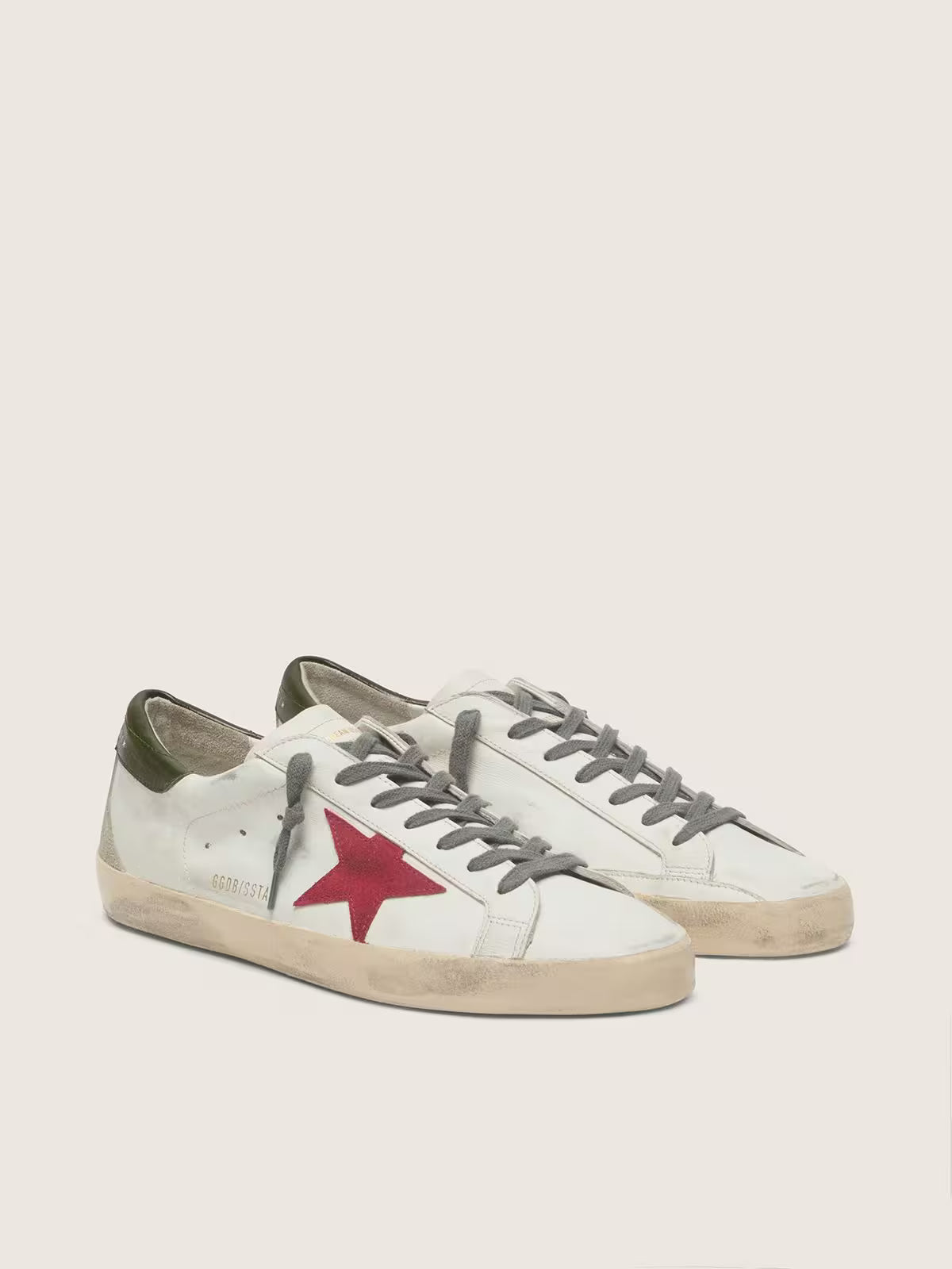 Star with red suede star and green leather heel tab