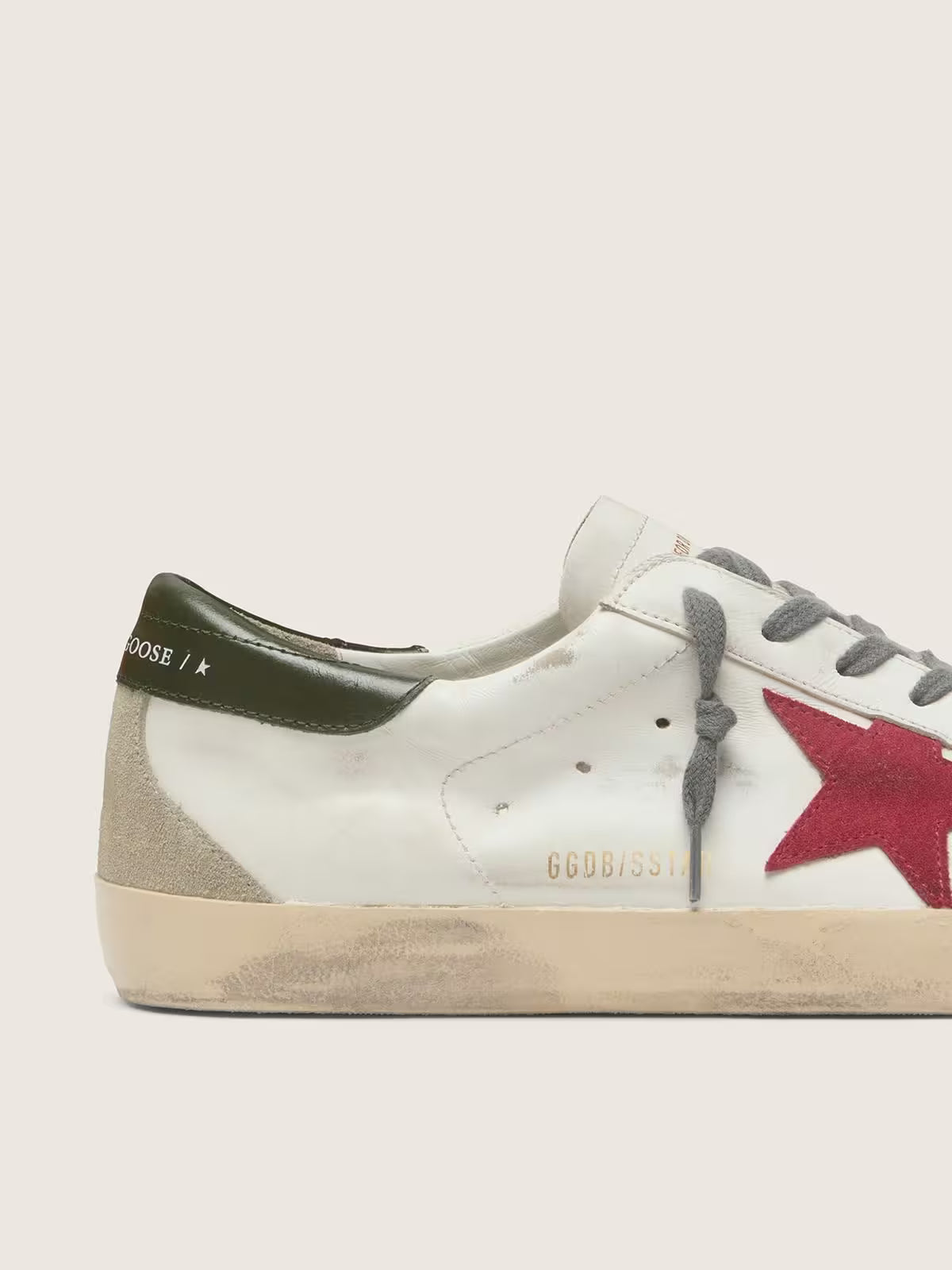 Star with red suede star and green leather heel tab
