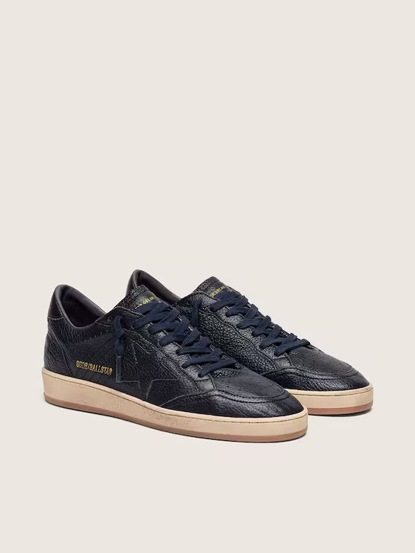 Star in navy-blue leather with tone-on-tone leather
