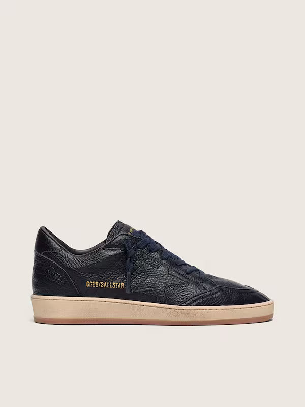 Star in navy-blue leather with tone-on-tone leather