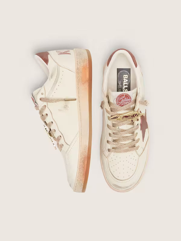 Star in white leather with rust leather