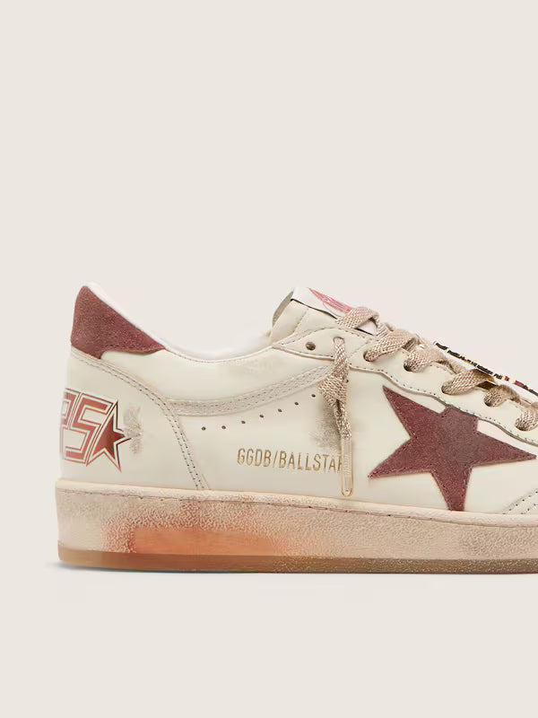 Star in white leather with rust leather
