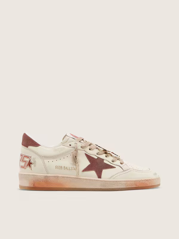 Star in white leather with rust leather